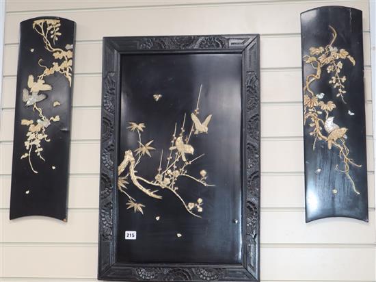 A Japanese Meiji shibayama panel (framed) and a pair of similar shaped smaller panels, Largest 70 x 46cm